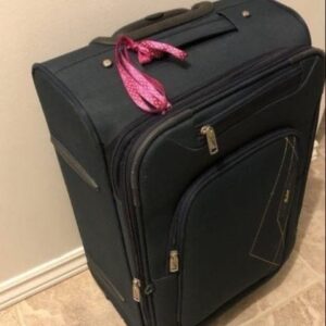 Why You Should Never Tie a Ribbon on Your Luggage, According to a Baggage Handler