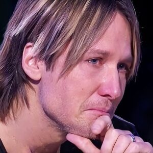 FANS RALLY AROUND KEITH URBAN AFTER HE ASKS THEM TO PRAY FOR HIM.