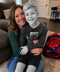 Coming home from my eight-year-old grandson’s funeral, I found him standing on my porch in torn clothes. I thought grief was making me see things—until he whispered, “Grandma, please don’t tell them I’m alive.”